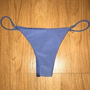Blue, ribbed, cheeky bottoms.